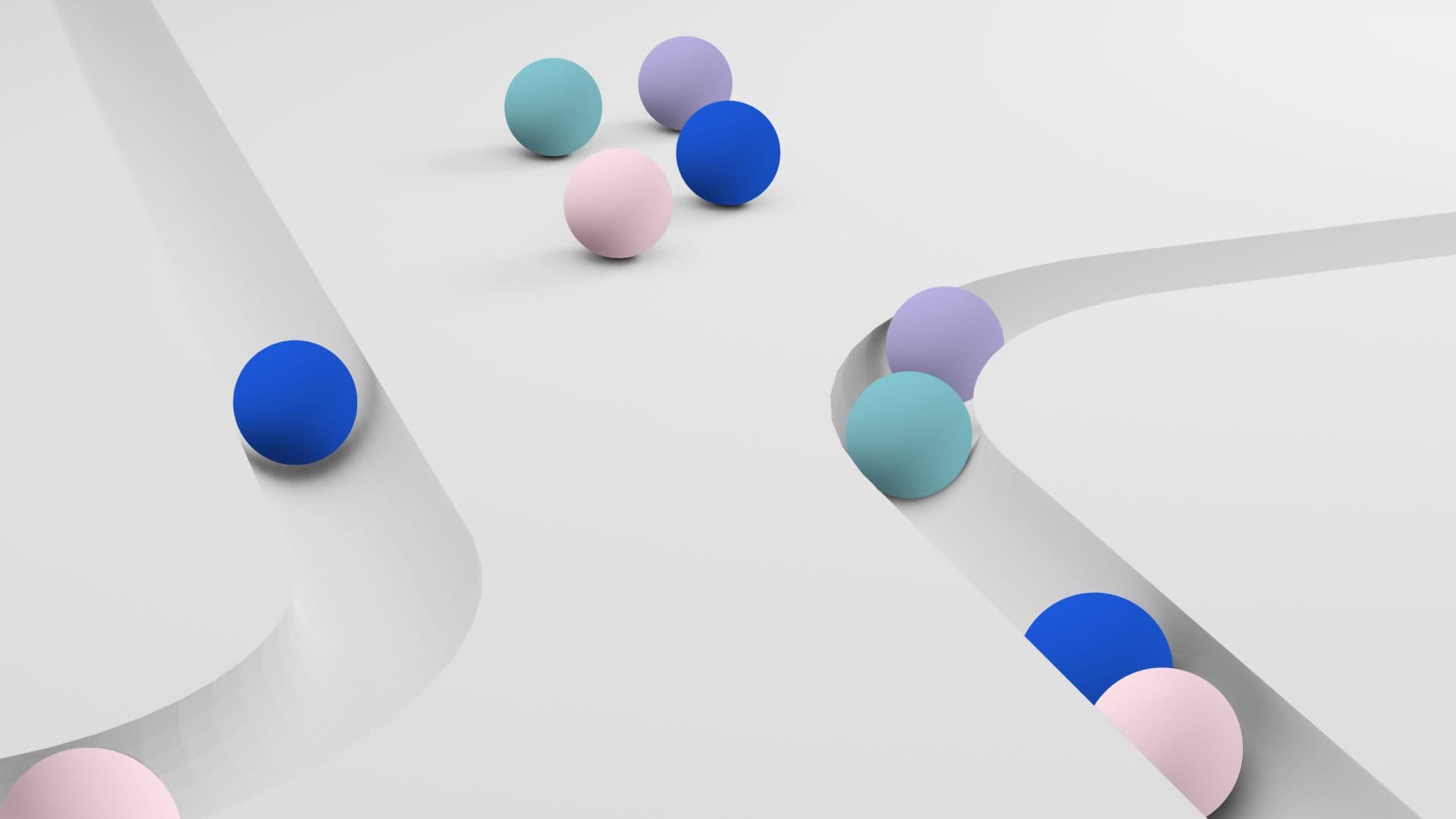 Colorful spheres roll along grooves while others stand on their own, suggesting different customer journeys and behavior